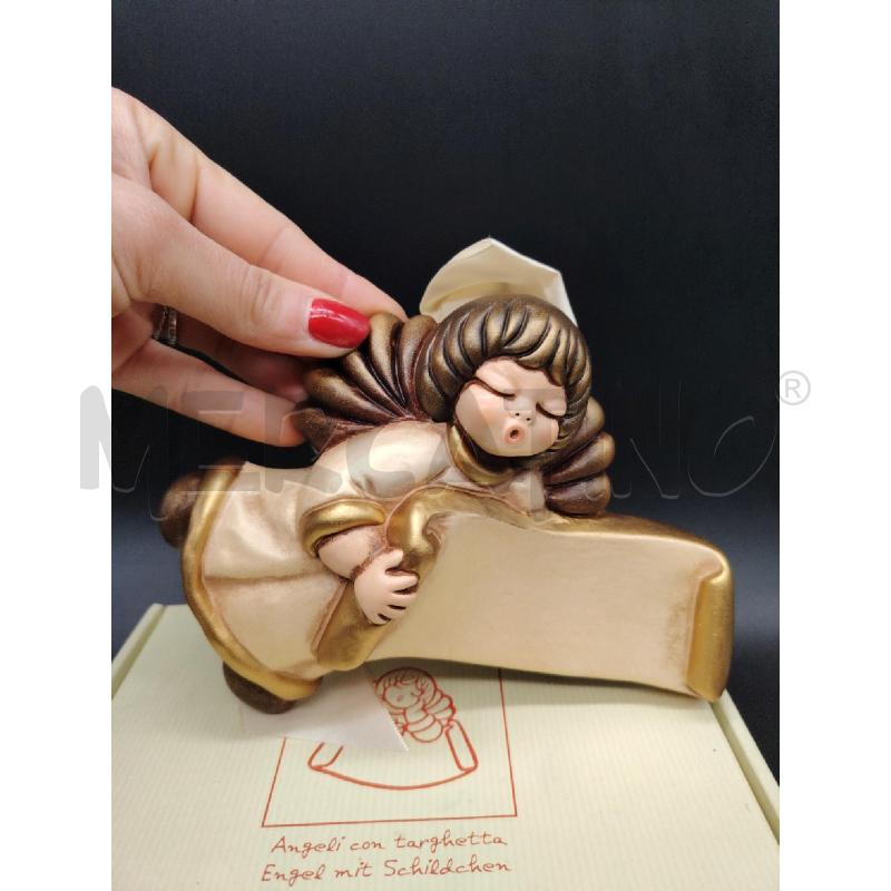 ANGELO CON TARGHETTA THUN  | Mercatino dell'Usato Roma eur 3