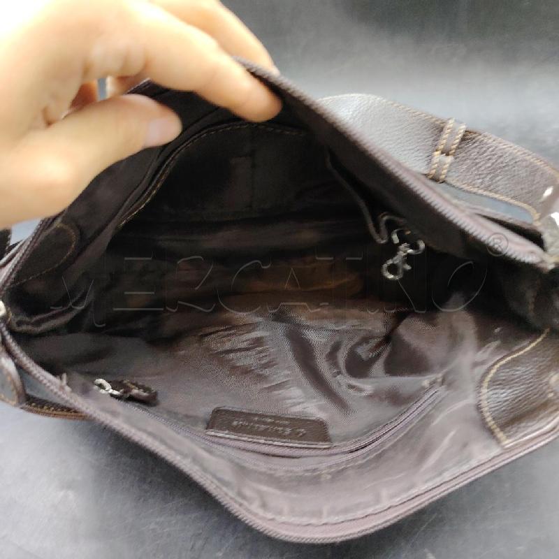 BORSETTA SAMSONITE PELLE MARRONE | Mercatino dell'Usato Roma eur 4