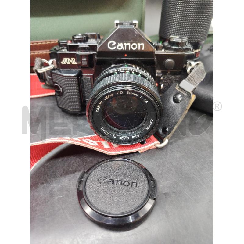 MACCHINA FOTOGRAFICA CANON A-1 + ACC | Mercatino dell'Usato Roma eur 2