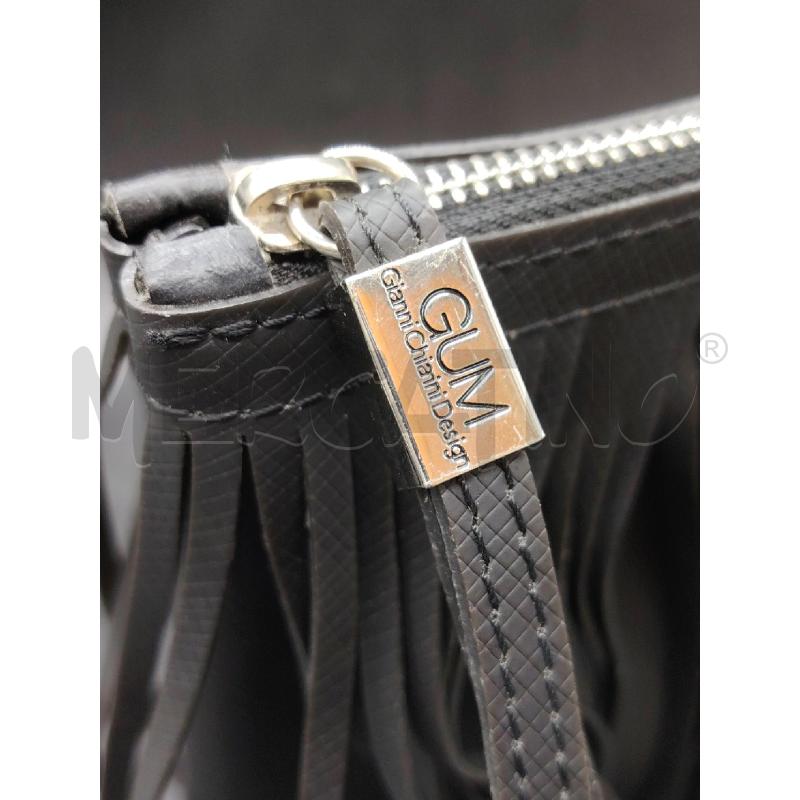 POCHETTE GUM NE FRANGE | Mercatino dell'Usato Roma eur 3