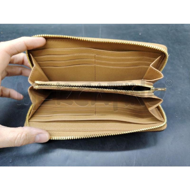 PORTA FOGLIO COACH BEIGE PELLE MARTELLATA | Mercatino dell'Usato Roma eur 3