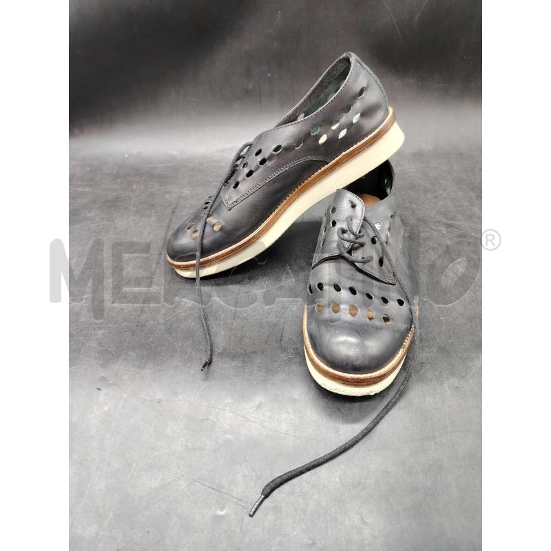 SCARPE D FRAU NE PELLE TRAFORATE | Mercatino dell'Usato Roma eur 1