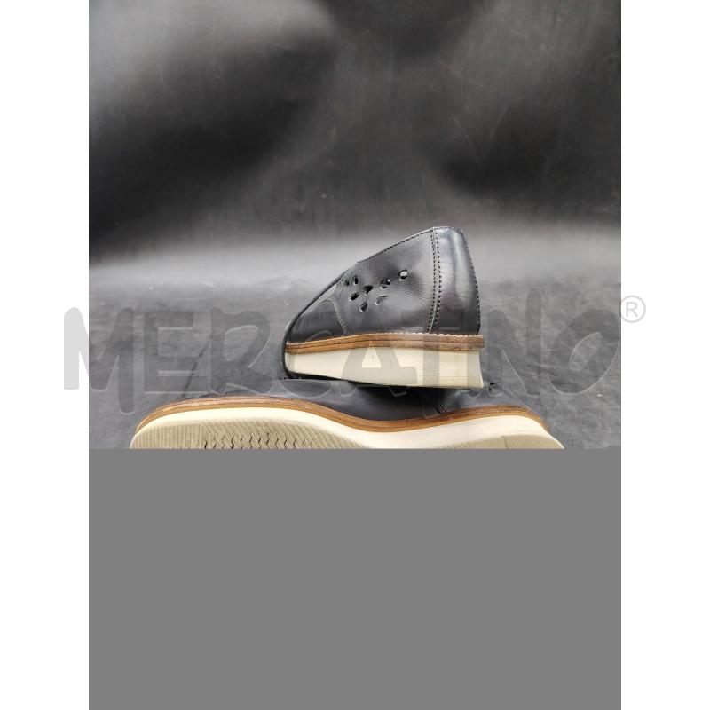 SCARPE D FRAU NE PELLE TRAFORATE | Mercatino dell'Usato Roma eur 3