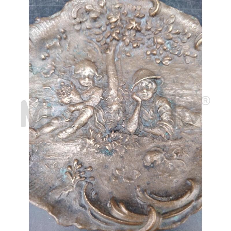 SVUOTA TASCHE BAMBINI IN RILIEVO BRONZO  | Mercatino dell'Usato Roma eur 2