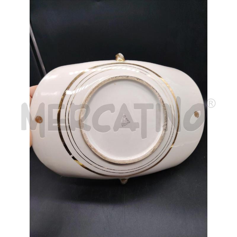 SVUOTA TASCHE FIORE BLU  | Mercatino dell'Usato Roma eur 3