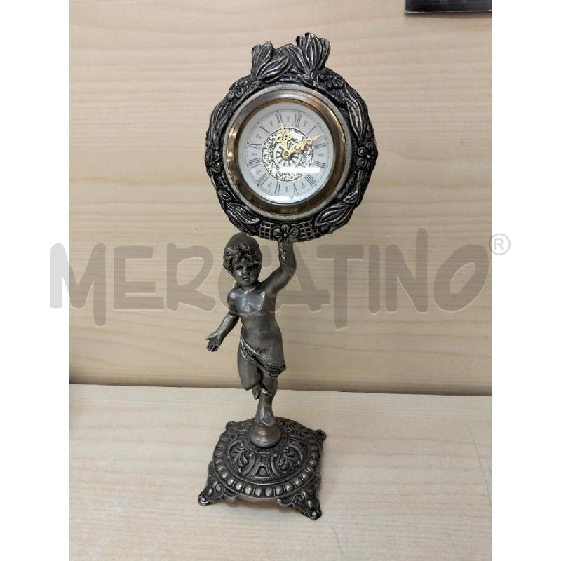 OROLOGIO METALLO PARIGINA C PUTTO | Mercatino dell'Usato Roma portonaccio 1