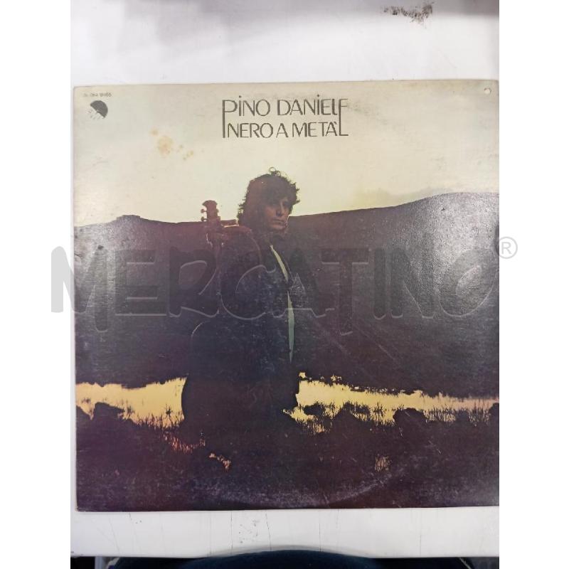 33 PINO DANIELE NERO A METÀ | Mercatino dell'Usato Roma viale tirreno 1