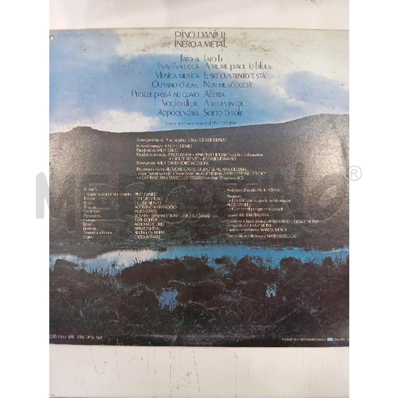 33 PINO DANIELE NERO A METÀ | Mercatino dell'Usato Roma viale tirreno 2