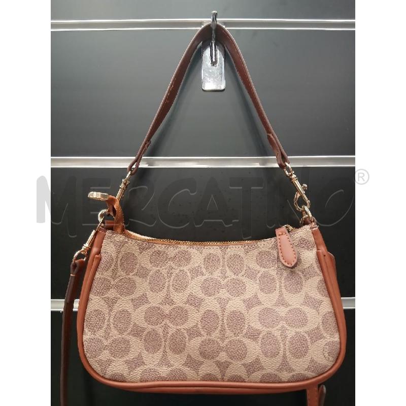 BORSETTA D COACH TOPPE SNOOPY  | Mercatino dell'Usato Roma viale tirreno 3