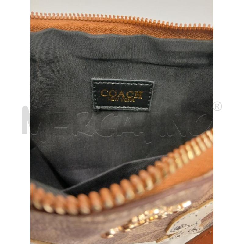 BORSETTA D COACH TOPPE SNOOPY  | Mercatino dell'Usato Roma viale tirreno 4