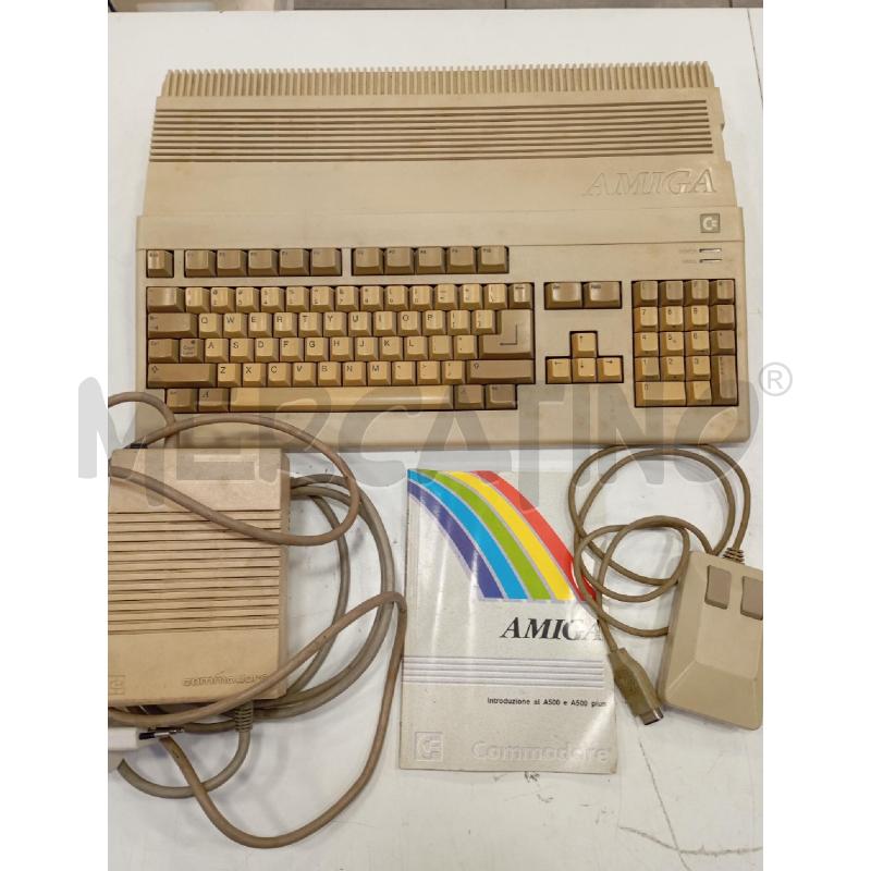 COMMODORE AMIGA A 500 CON CARICATORE E LIBRETTO INTRODUTTIVO | Mercatino dell'Usato Roma viale tirreno 1