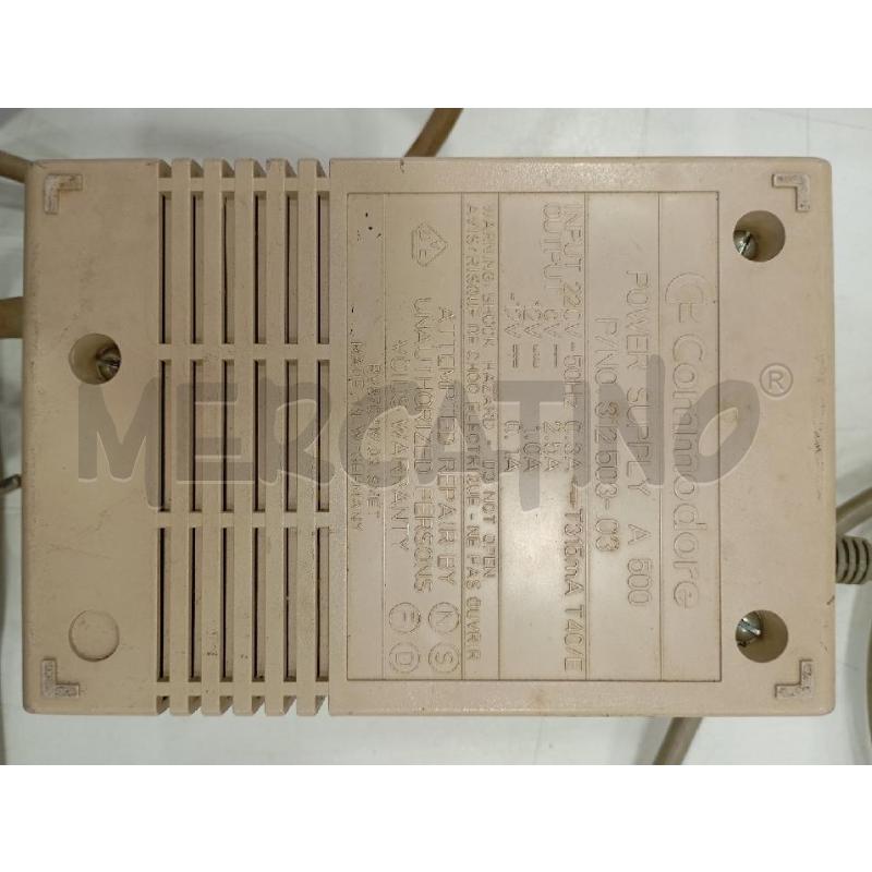 COMMODORE AMIGA A 500 CON CARICATORE E LIBRETTO INTRODUTTIVO | Mercatino dell'Usato Roma viale tirreno 2
