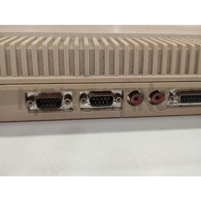 COMMODORE AMIGA A 500 CON CARICATORE E LIBRETTO INTRODUTTIVO | Mercatino dell'Usato Roma viale tirreno 3