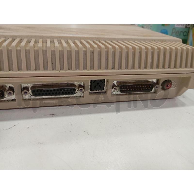 COMMODORE AMIGA A 500 CON CARICATORE E LIBRETTO INTRODUTTIVO | Mercatino dell'Usato Roma viale tirreno 5