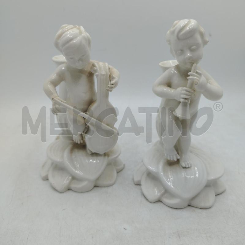 COPPIA PORTACANDELA PUTTI BIA | Mercatino dell'Usato Roma viale tirreno 2