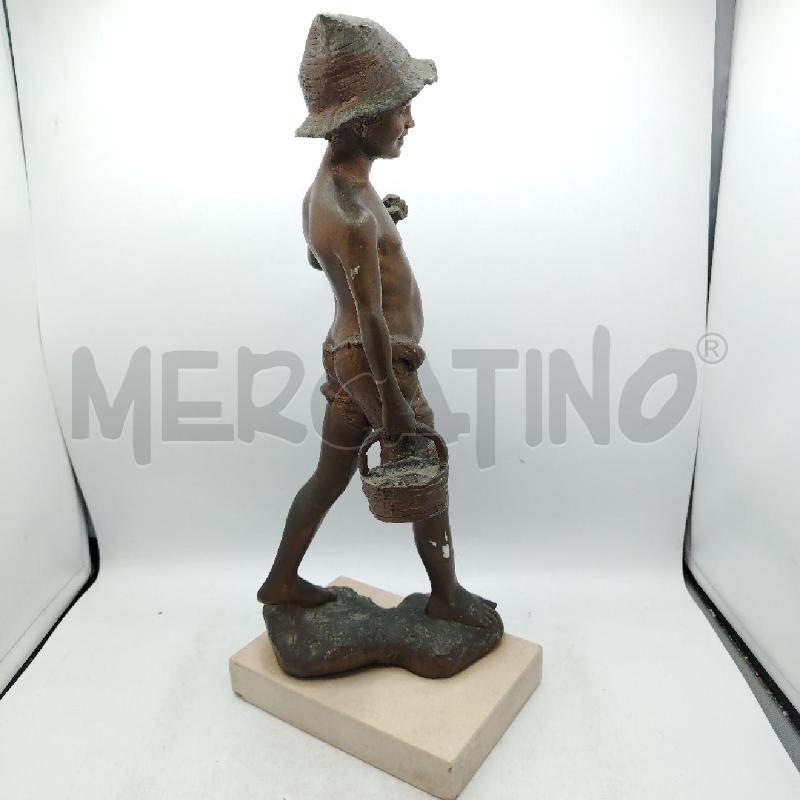 SCULTURA BIMNBO BASE TRAVERTINO A FIRMA DE MARTINO | Mercatino dell'Usato Roma viale tirreno 4
