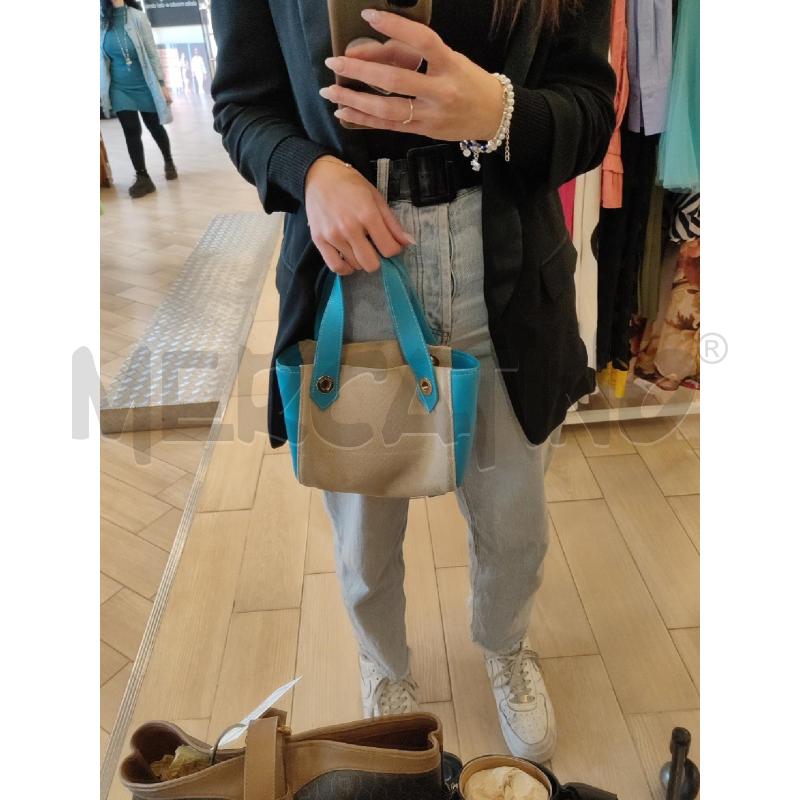POCHETTE LORO PIANA CELESTE LINO  | Mercatino dell'Usato Roma montemario 4