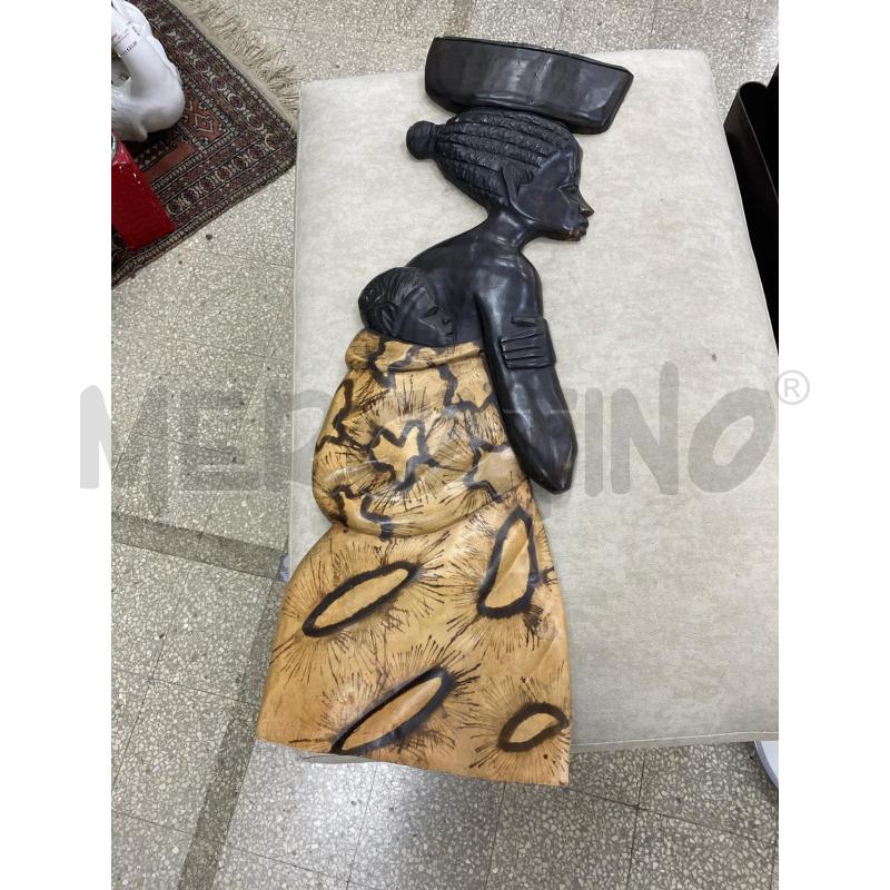 PLACCA DONNA AFRICANA | Mercatino dell'Usato Roma porta di roma 1