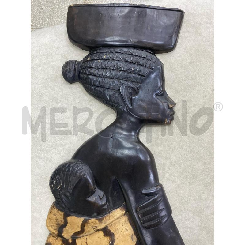 PLACCA DONNA AFRICANA | Mercatino dell'Usato Roma porta di roma 2