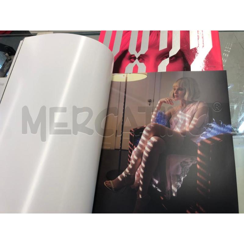LIBRO CALENDARIO PIRELLI 2022 BRYAN ADAMS | Mercatino dell'Usato Roma somalia 4