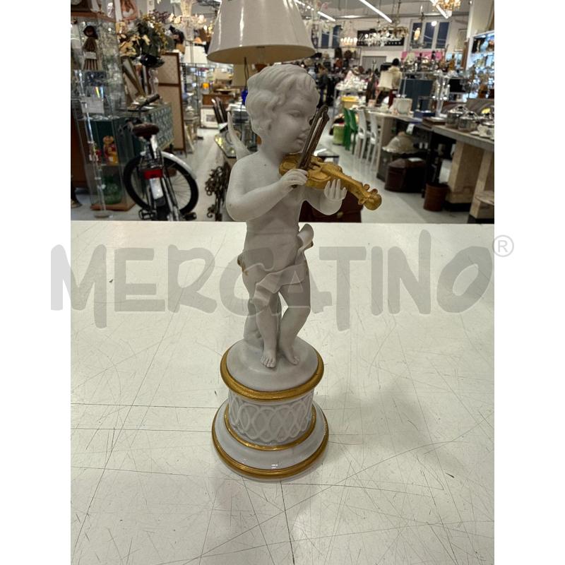 PUTTO ALI DORATE SUONATORE | Mercatino dell'Usato Roma somalia 1