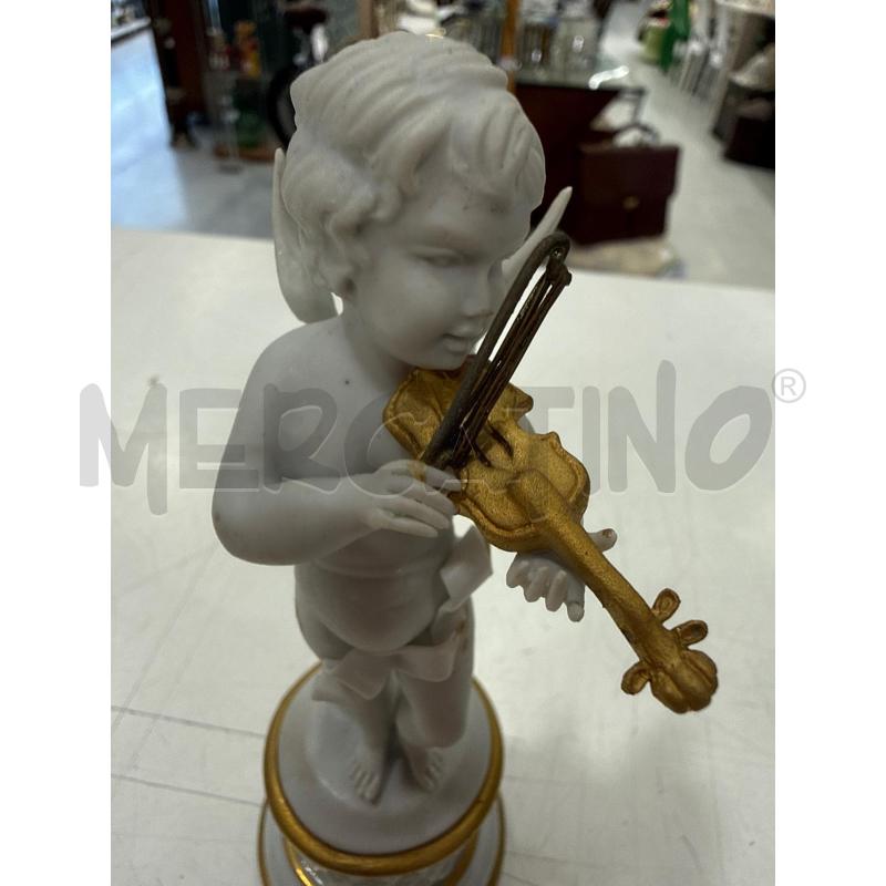 PUTTO ALI DORATE SUONATORE | Mercatino dell'Usato Roma somalia 2