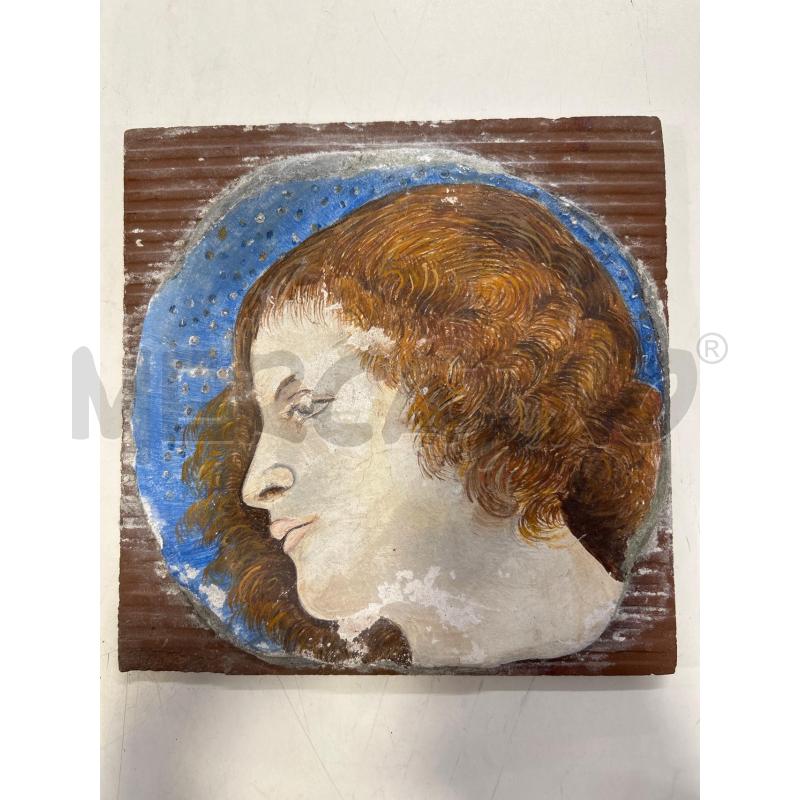 PLACCA DECORATIVA SU PIASTRELLA VOLTO | Mercatino dell'Usato Roma rebibbia 1