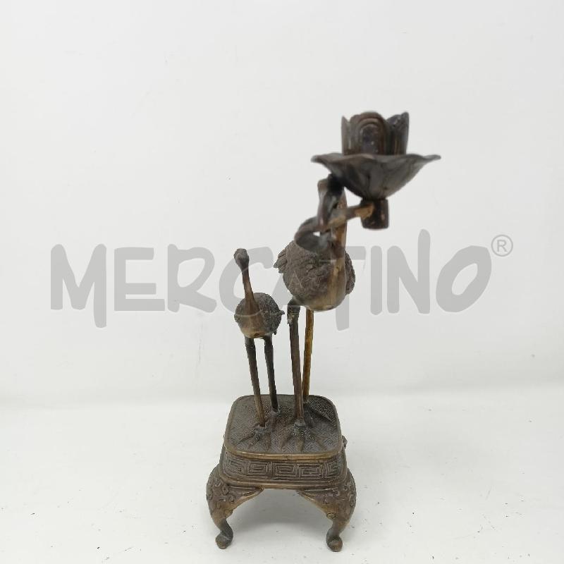 CANDELABRO BRONZO RAFFIGURANTE GRU DIF | Mercatino dell'Usato Roma re di roma 2