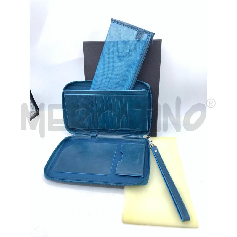 PORTA FOGLIO PIQUADRO CELESTE BLUETTE  | Mercatino dell'Usato Roma re di roma 3