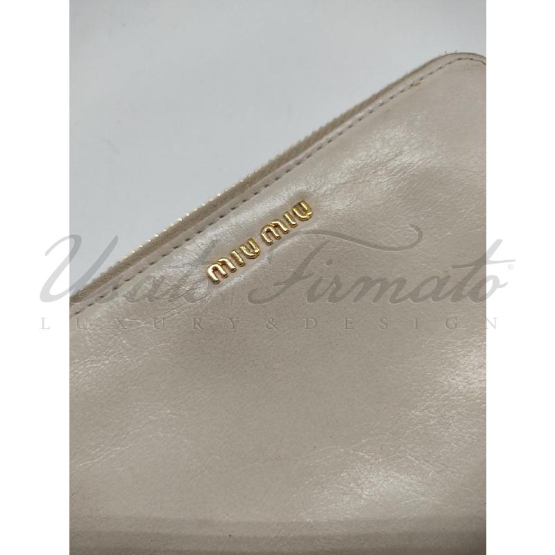 PORTA FOGLIO MIU MIU PELLE OCRA COD 194 | Mercatino dell'Usato Roma parioli 3