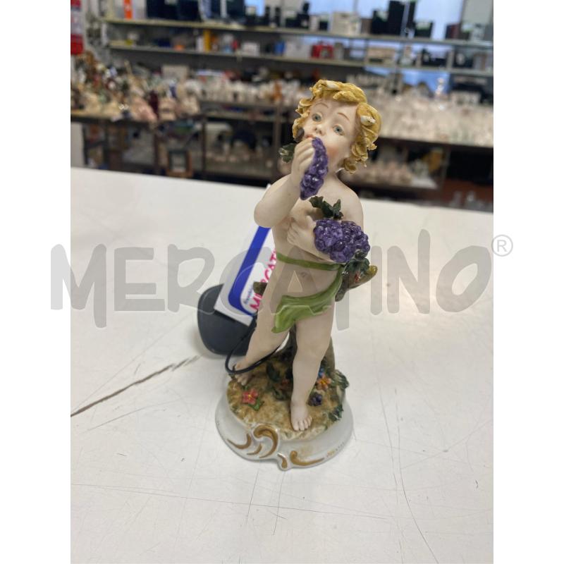 STATUETTA ANGOLINO CON GRAPPOLO D'UVA | Mercatino dell'Usato Roma casalotti 1