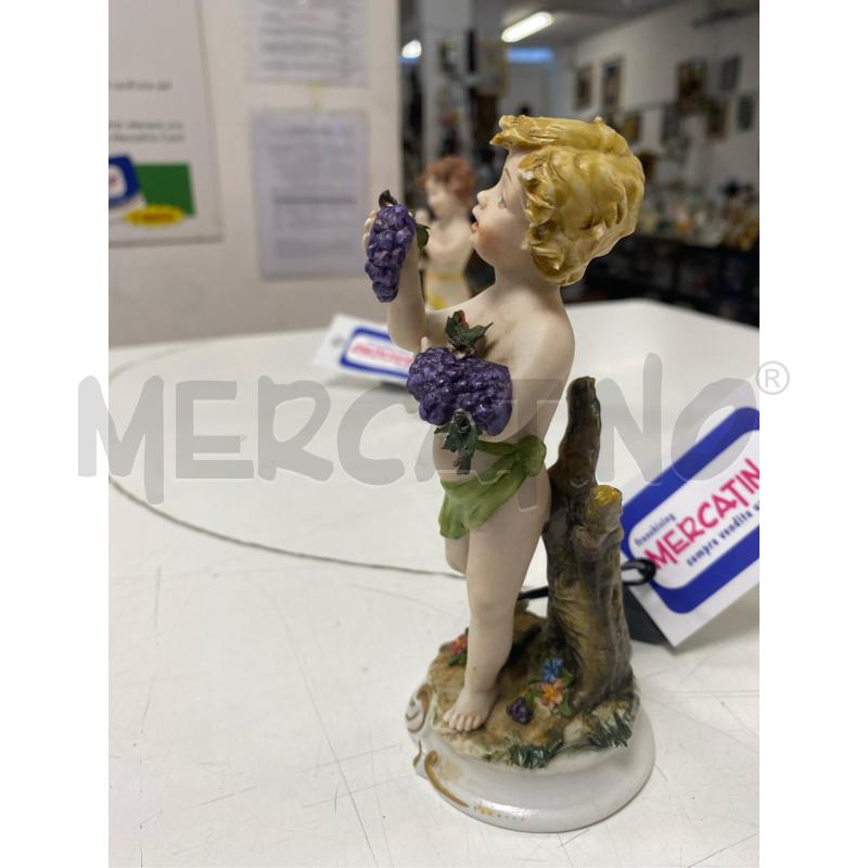 STATUETTA ANGOLINO CON GRAPPOLO D'UVA | Mercatino dell'Usato Roma casalotti 3