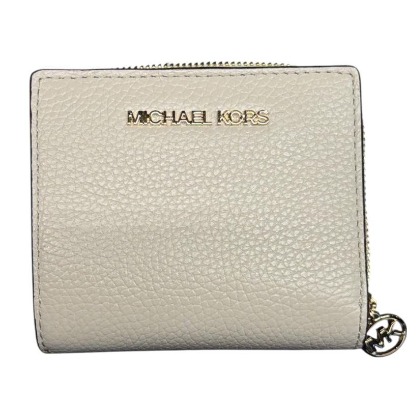 PORTA FOGLIO MICHAEL KORS BEIGE | Mercatino dell'Usato Roma ostia 1