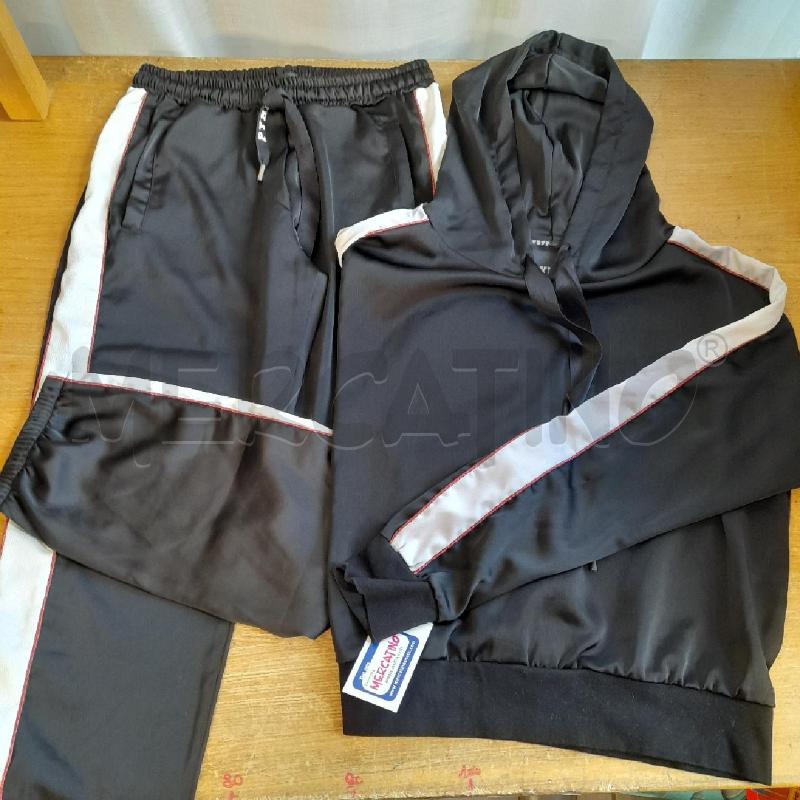 TUTA DONNA NERA PYREX  | Mercatino dell'Usato Sondrio 1