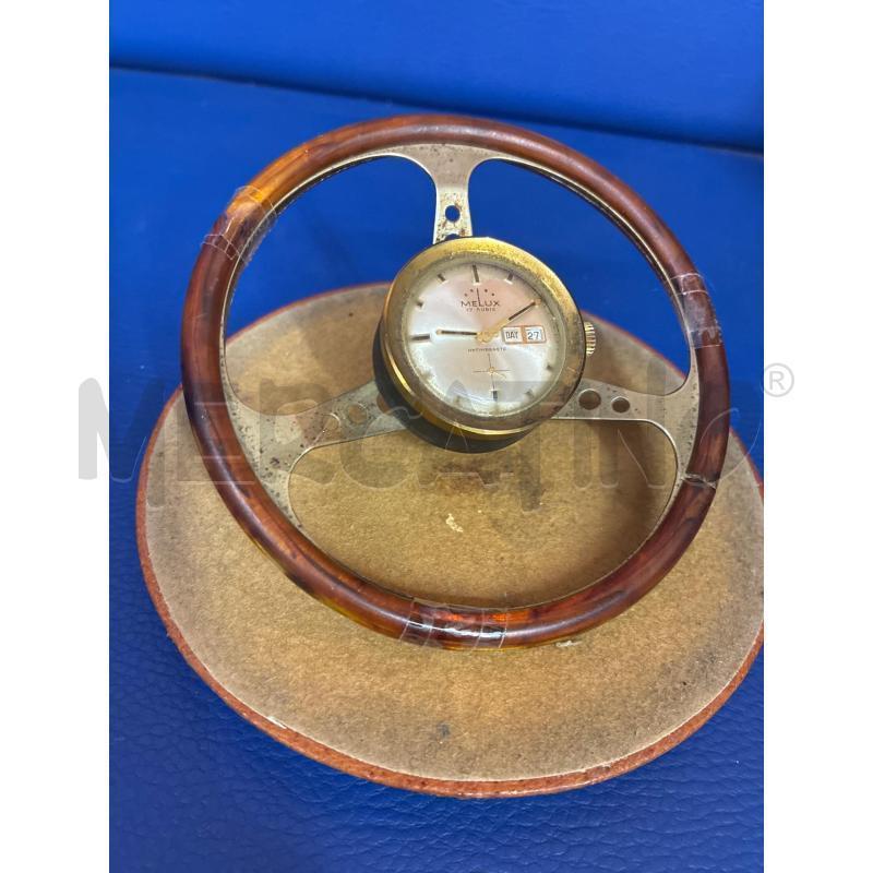 OROLOGIO DA TAVOLO MELUX 17 RUBIS VOLANTE AUTO CON DATARIO FUNZIONANTE | Mercatino dell'Usato Teramo 4