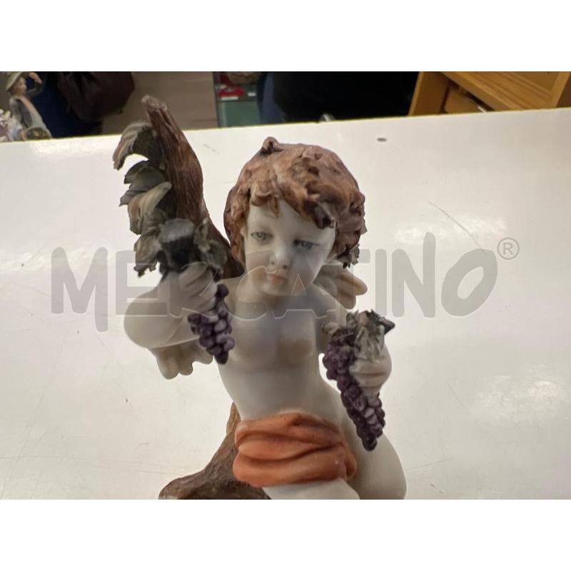 STATUETTA BIMBO BACCO CAPODIMONTE SU TRESPOLO | Mercatino dell'Usato Teramo 4