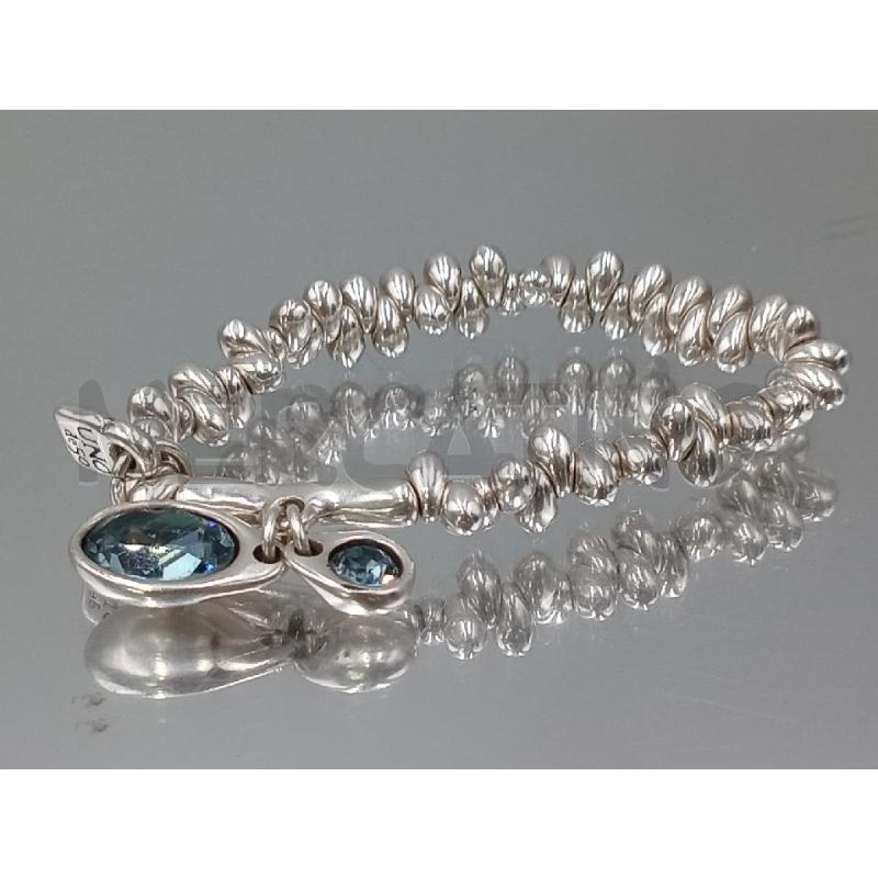 BRACCIALETTO UNO DE 50 A MOLLA CON DUE GICCIE PIETRA AZZURRA  | Mercatino dell'Usato Moncalieri bengasi 1
