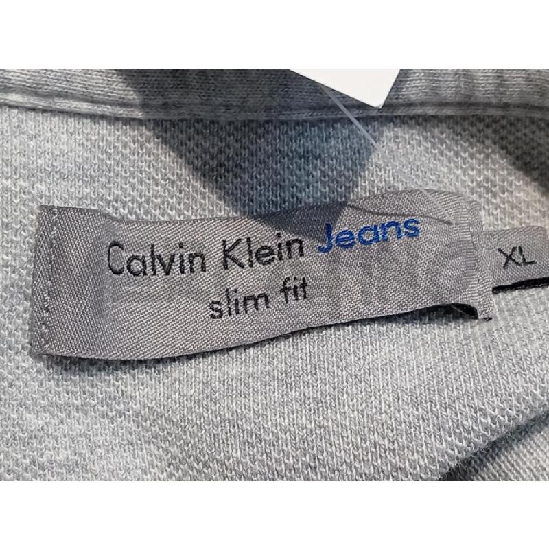 POLO UOMO CALVIN KLEIN GRIGIA LOGO NERO  | Mercatino dell'Usato Moncalieri bengasi 5