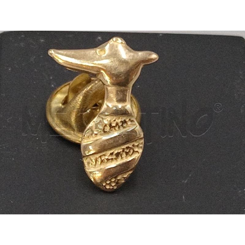 SPILLA DORATA FORMA LOGO TRUSSARDI STILIZZATO  | Mercatino dell'Usato Moncalieri bengasi 1