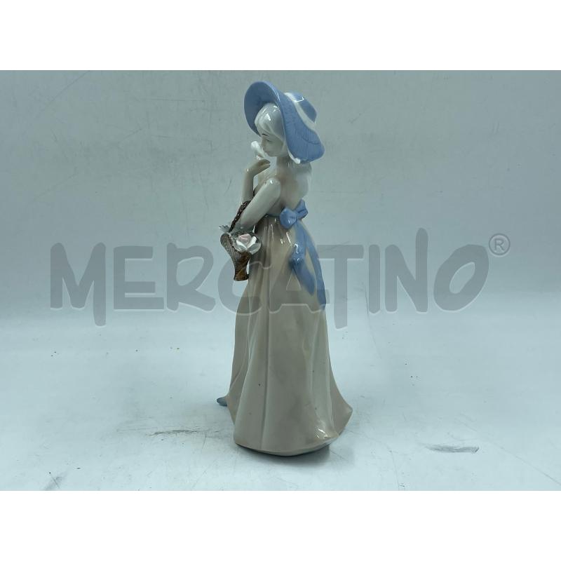STATUINA PORCELLAN UNA SIGNORA CON CESTINO | Mercatino dell'Usato Torino via ceresole 3