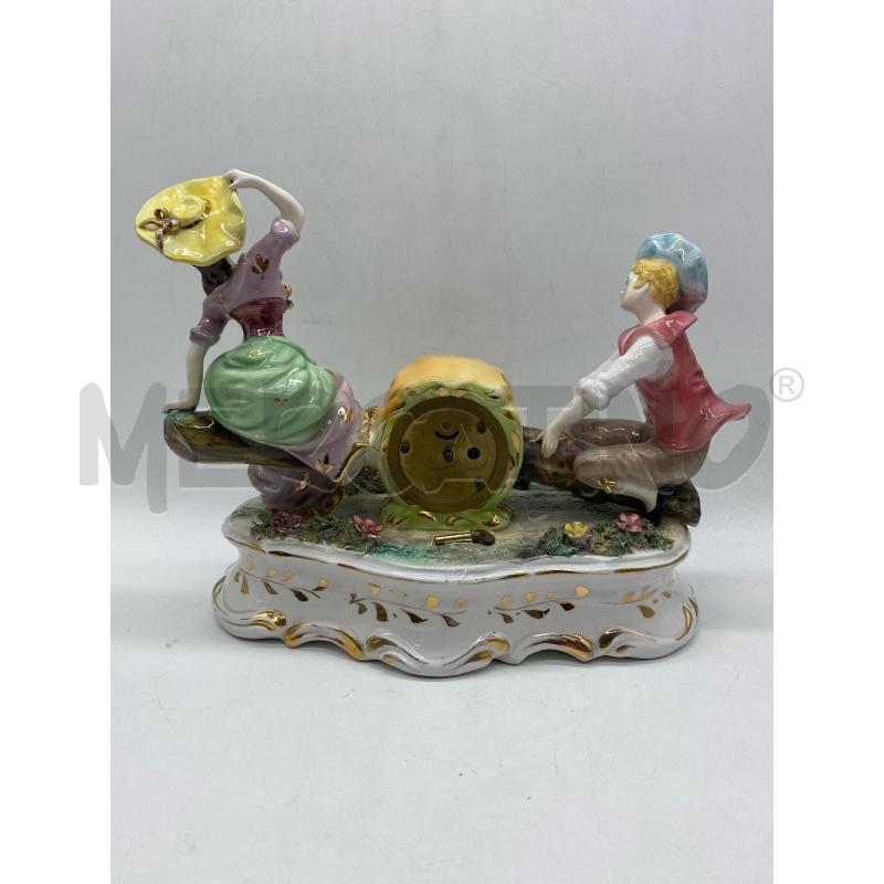 SOPRAMMOBILE GRUPPO CERAMICA CON OROLOGIO | Mercatino dell'Usato Torino c.so traiano 5