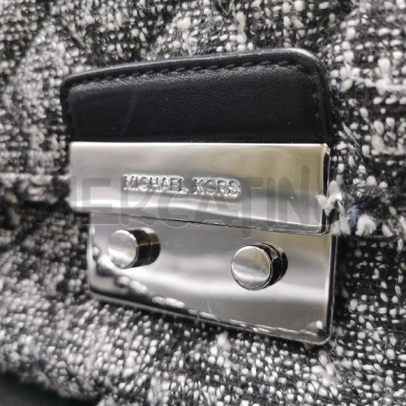 BORSA DONNA MICHAEL KORS TRAPUNTATA BIANCO E NERA | Mercatino dell'Usato Torino nizza 3