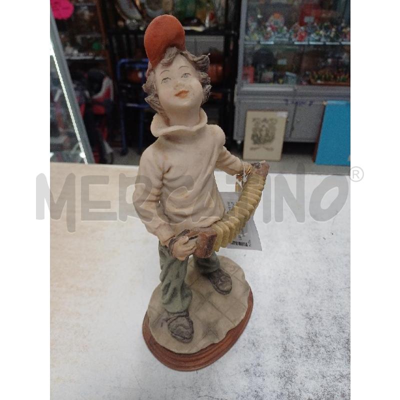 STATUETTA RAGAZZO RESINA COMBI | Mercatino dell'Usato Moncalieri - fr. moriondo 2
