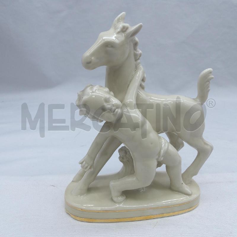 STATUINA BIMBO CON PULEDRO PORCELLANA | Mercatino dell'Usato San maurizio canavese 1