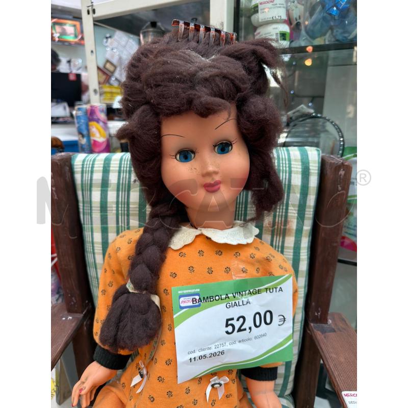 BAMBOLA VINTAGE TUTA GIALLA  | Mercatino dell'Usato Trapani via libica 2