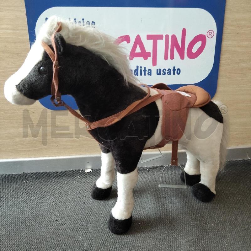 CAVALLO BIANCO NERO CON SELLA CHE GALOPPA | Mercatino dell'Usato Domodossola 1