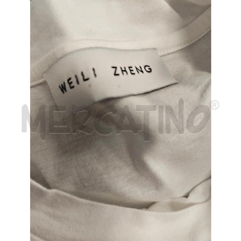CANOTTA D WEILI ZHENG BIANCO SPALLOTTI  | Mercatino dell'Usato Verona fiera 4