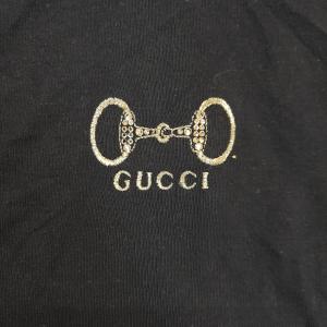 Gucci  Borsa tracolla GG pelle nero con chiusura metallica - Donna – Wanan  Luxury